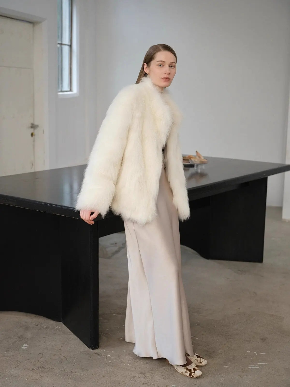 Long Nocturne off-white Saga fox fur coat side styling view