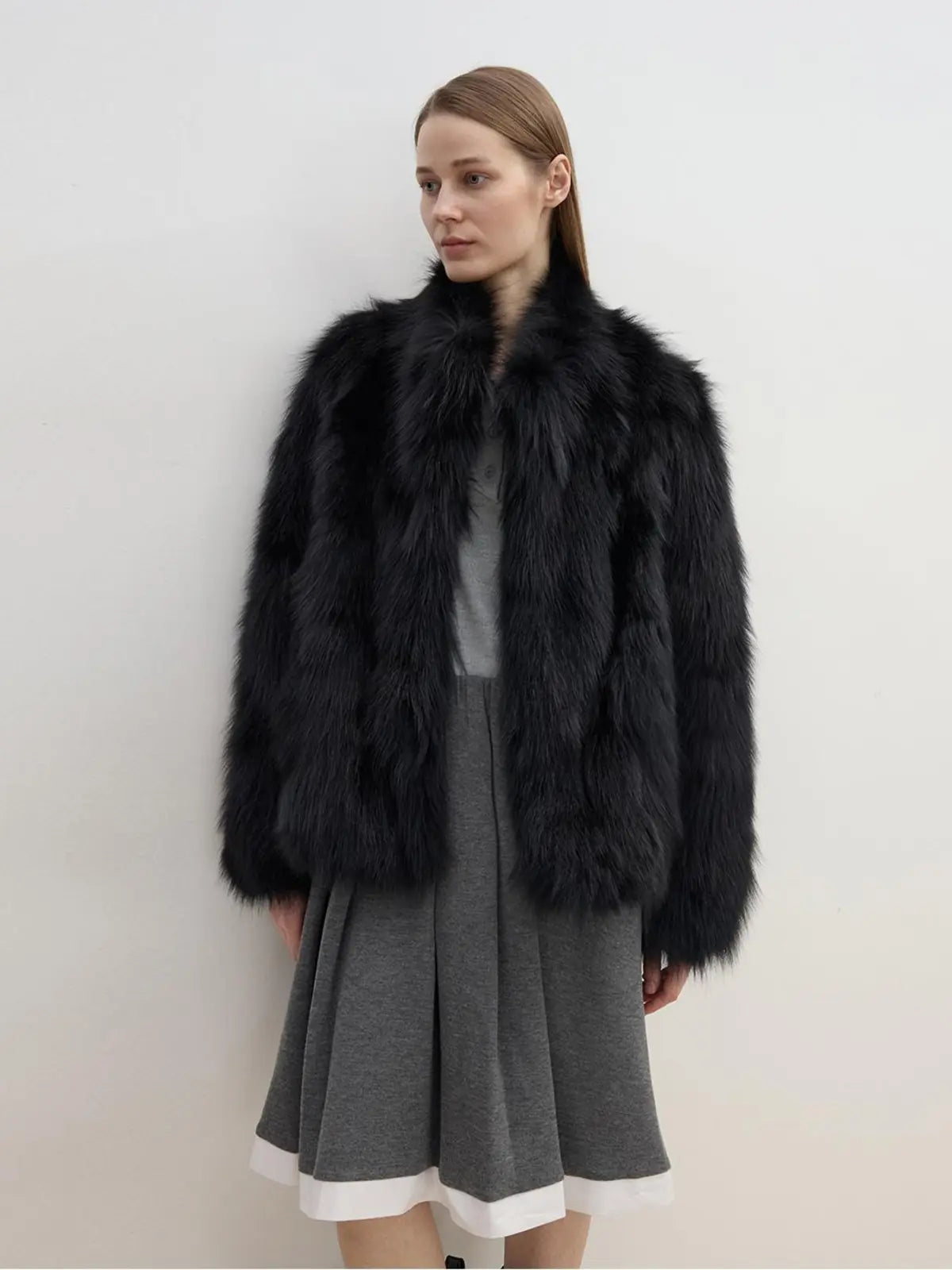 Long Nocturne reddish brown Saga fox fur coat on model
