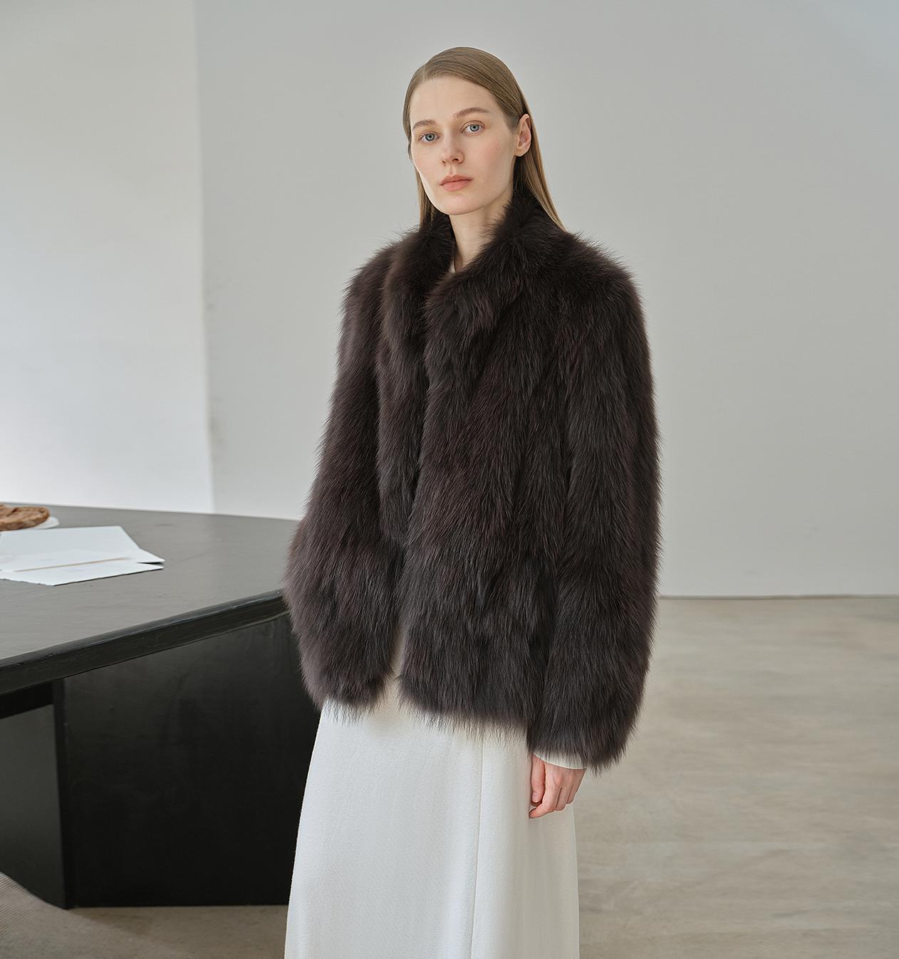 Long black fox fur coat reference for professional care and condition decisions