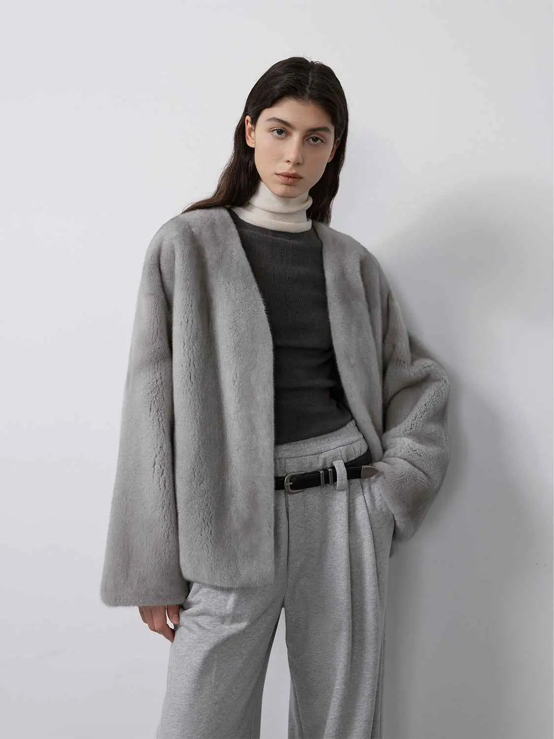 Model wearing Fireladyfur Louvre Silver Blue Natural mink V-neck jacket front view