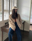 Model wearing Fireladyfur Louvre Beige Natural mink V-neck jacket indoor view