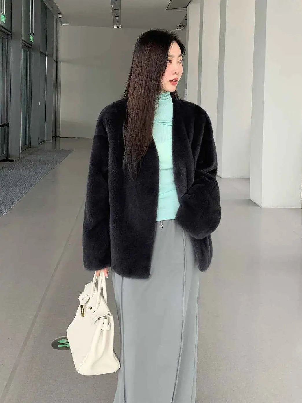 Model wearing Fireladyfur Louvre Elf Gray mink V-neck jacket front view