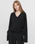 Machine washable Tencel wool V-neck elastic hem top black on Maryna front view