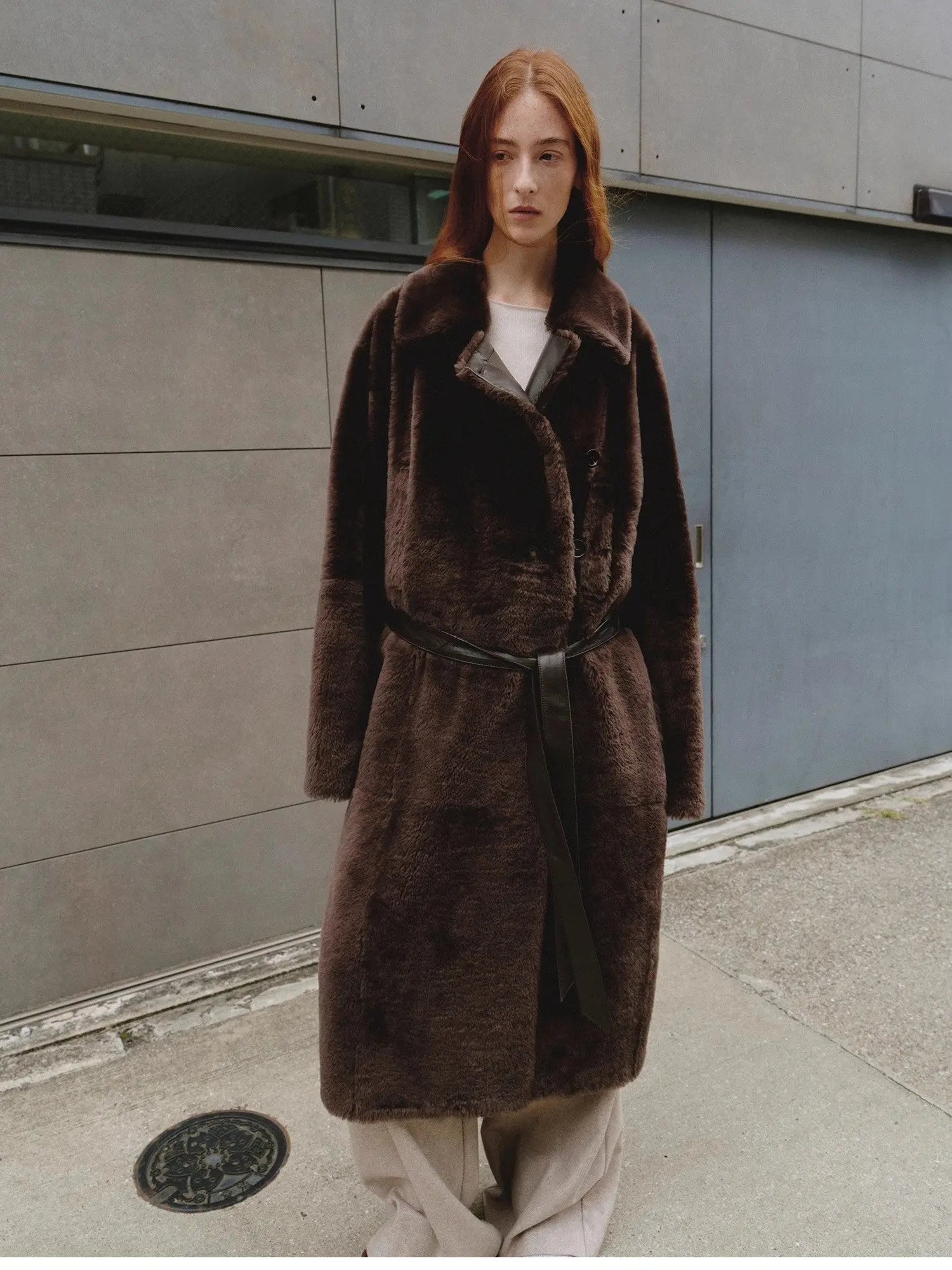 Mocha Phantom long copper brown shearling coat styled on model