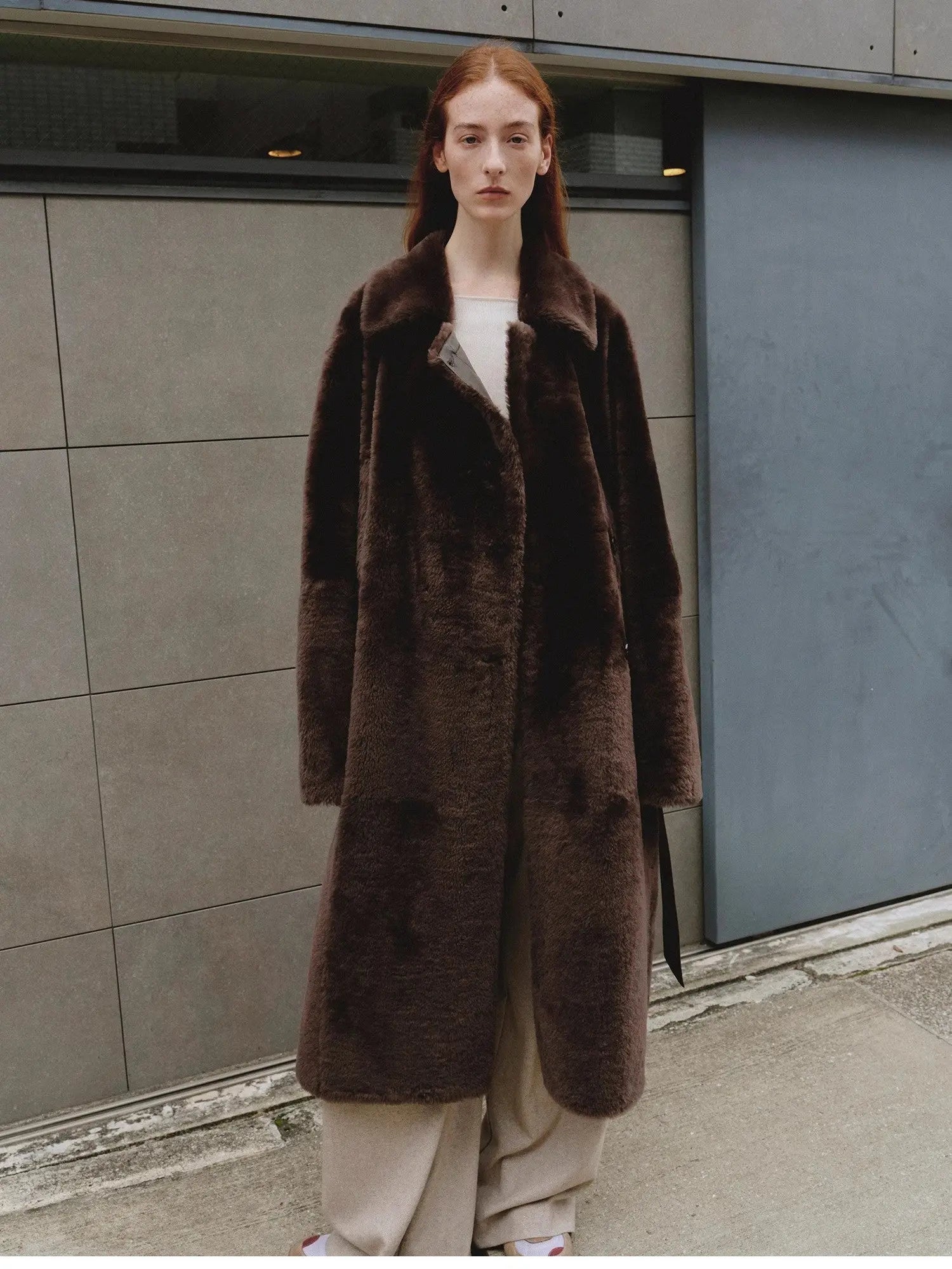 Mocha Phantom copper brown coat showing relaxed dropped shoulders