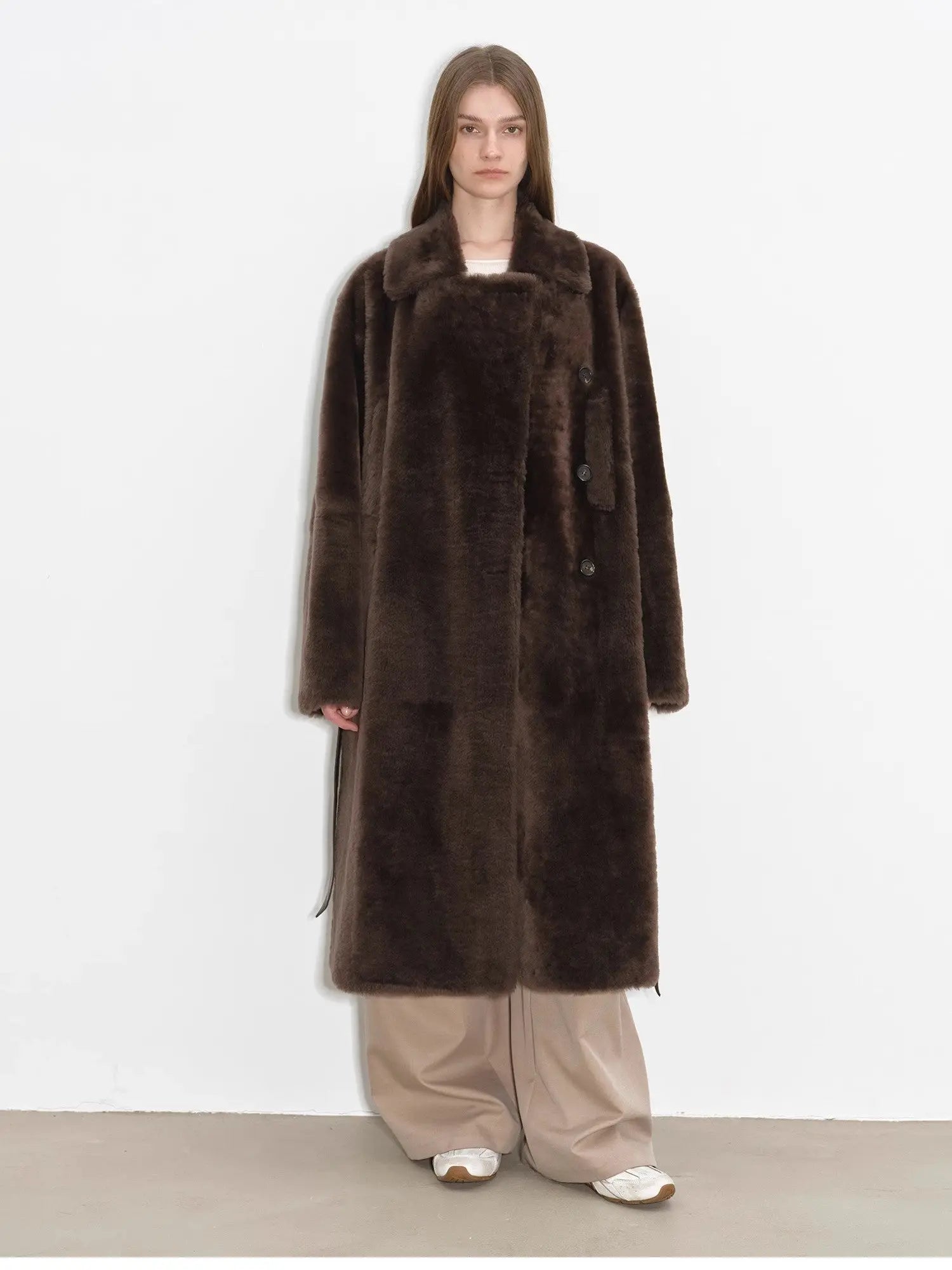 Front studio view of copper brown Merino shearling coat