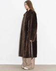 Side studio view of Mocha Phantom long shearling coat