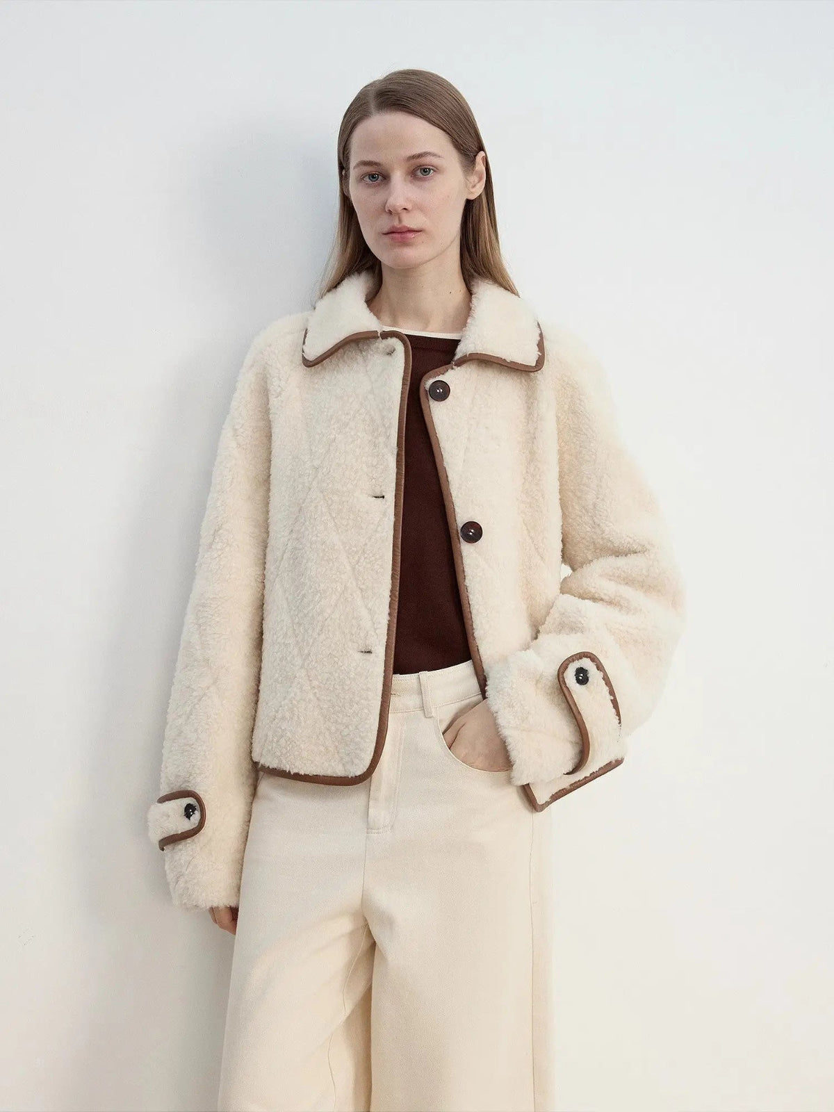 Modern Milk Cafe off-white shearling jacket with contrast trim, close front view