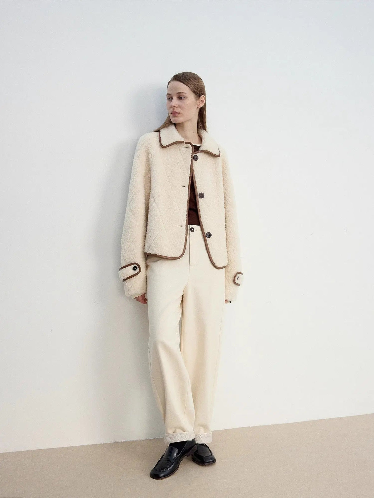 Off-white cropped Merino shearling jacket outfit, angled full-length view