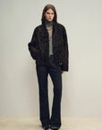Model styling the Mole Manor purple plum lake lamb shearling coat