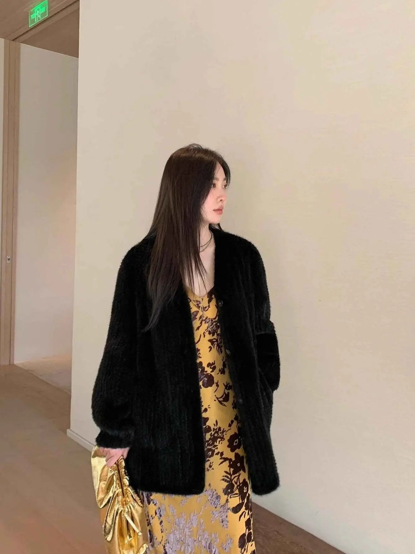 Moon Serenade Black mink coat relaxed standing view