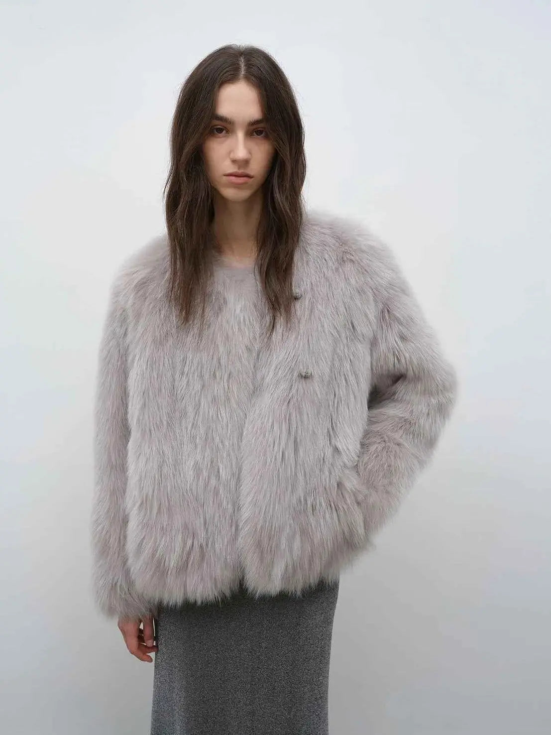 Model wearing Morning Mist Manor Green Gray fox fur coat, front view