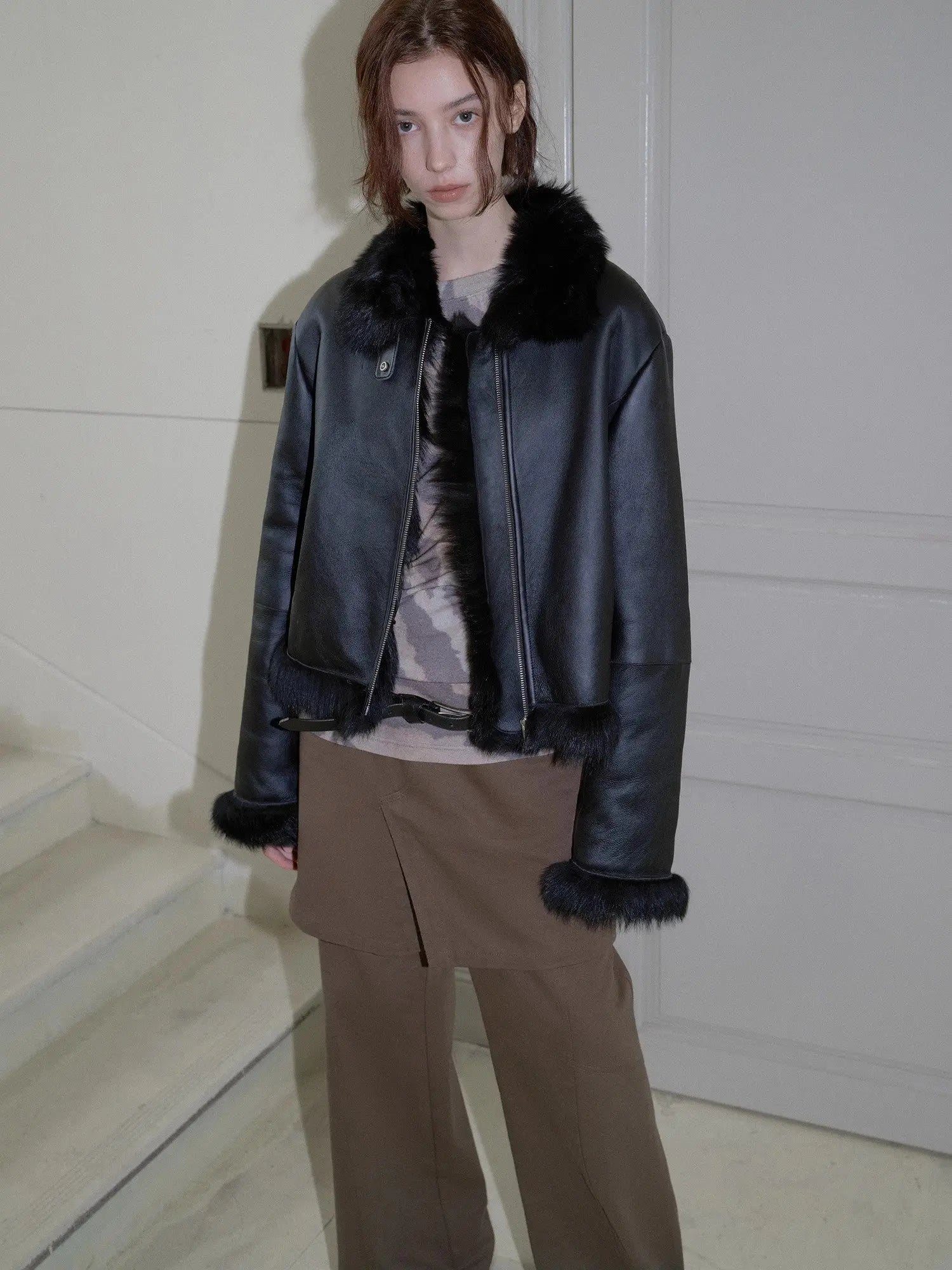 Black Toscana shearling short motorcycle jacket, full-length styling view