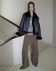 Black Toscana shearling biker jacket, relaxed full-length view
