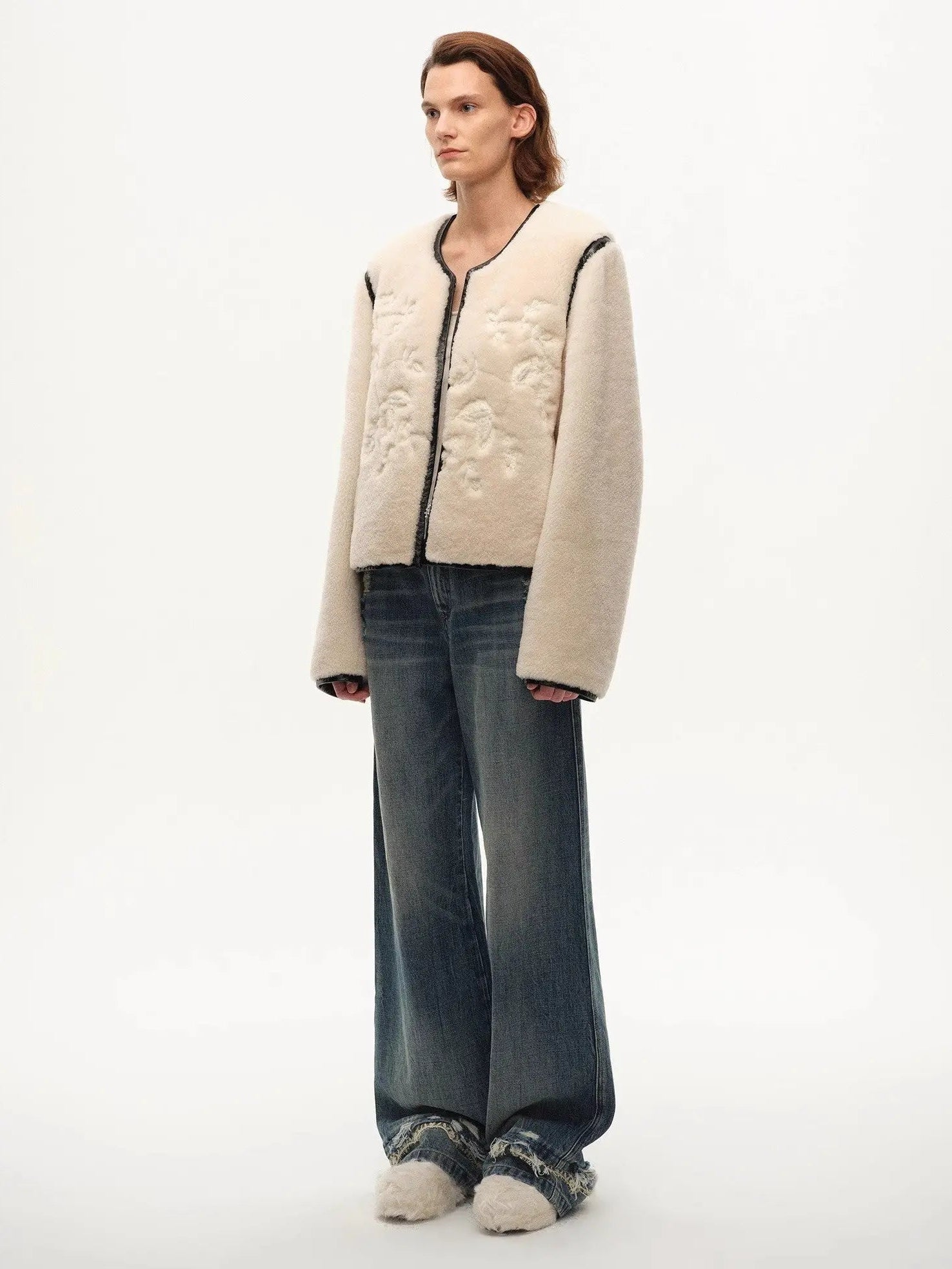 Model wearing the Muse Project embroidered Merino shearling coat, view 8