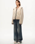 Model wearing the Muse Project embroidered Merino shearling coat, view 8