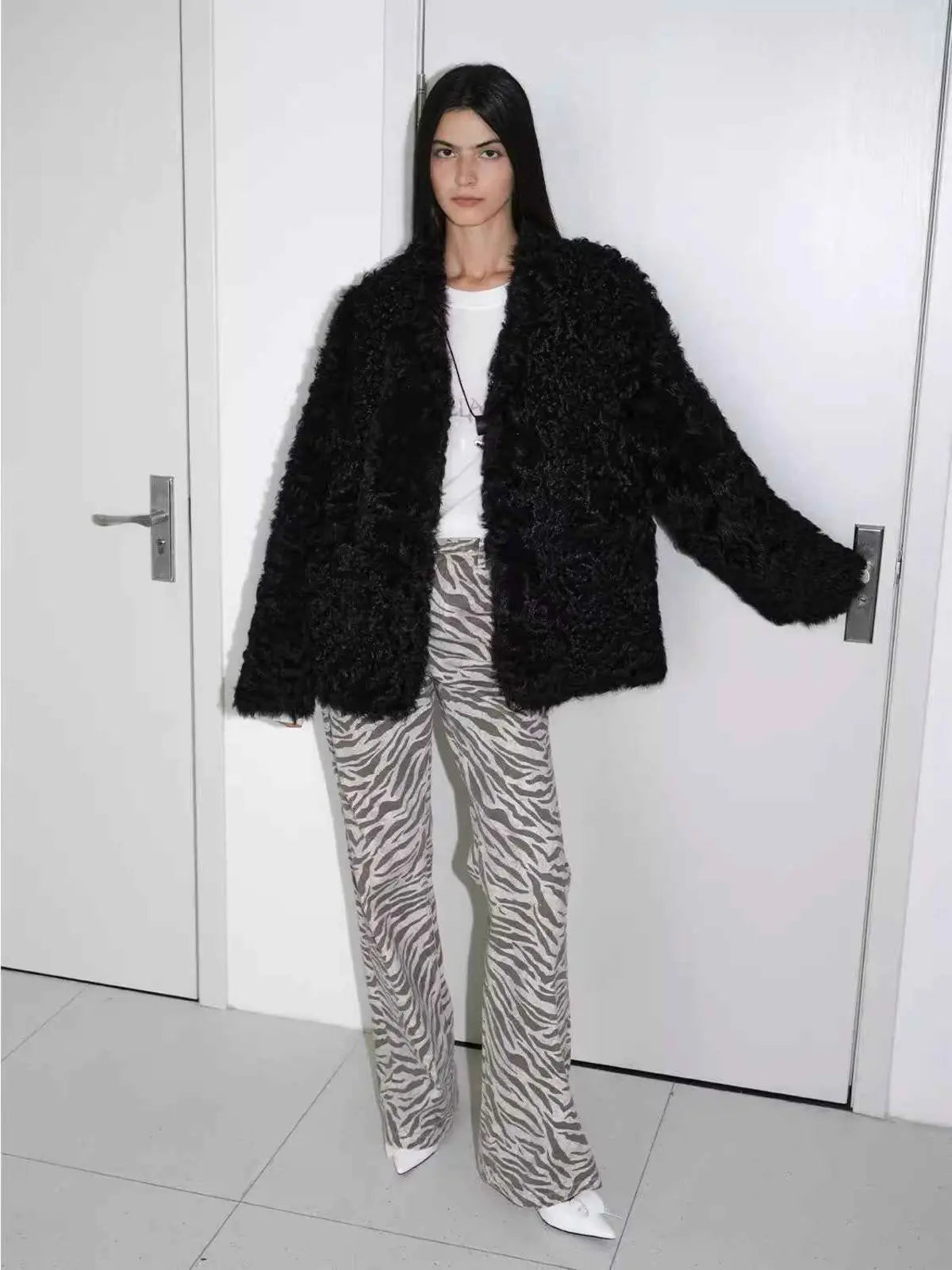 My Little Curly black Toscana shearling jacket on model, front view