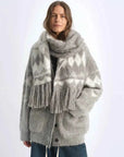 Light gray Nepal alpaca wool tassel scarf styled on a woman - Fireladyfur