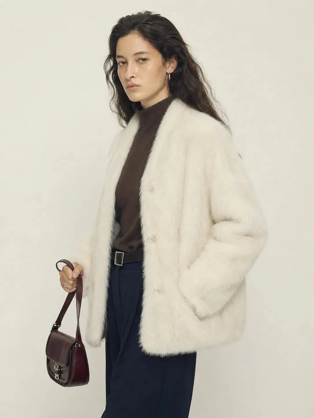 Night in Paris off-white Toscana shearling V-neck coat, three-quarter view