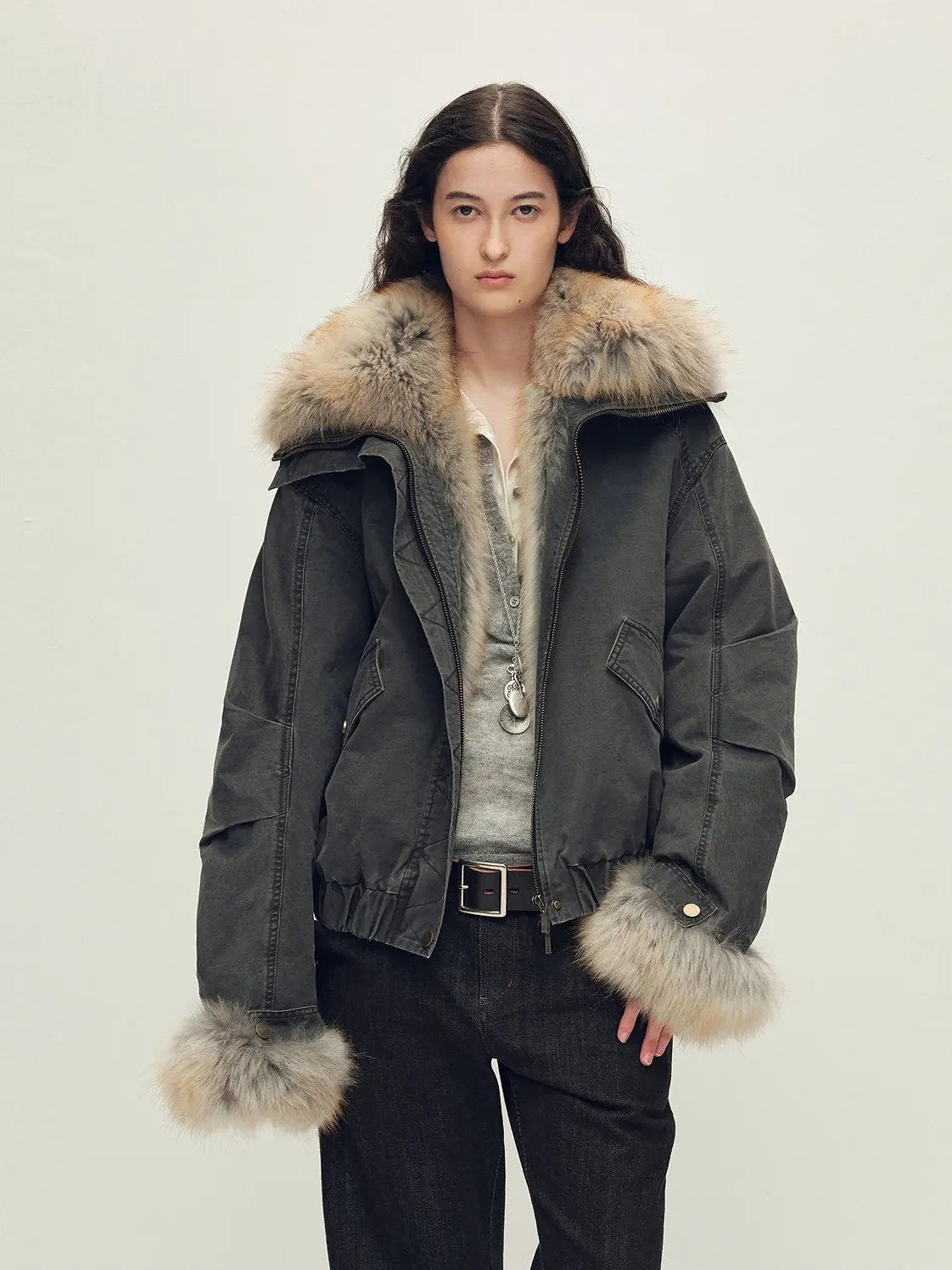 Model wearing Firelady Fur Nordic Woods Graphite Gray raccoon fur down parka front view