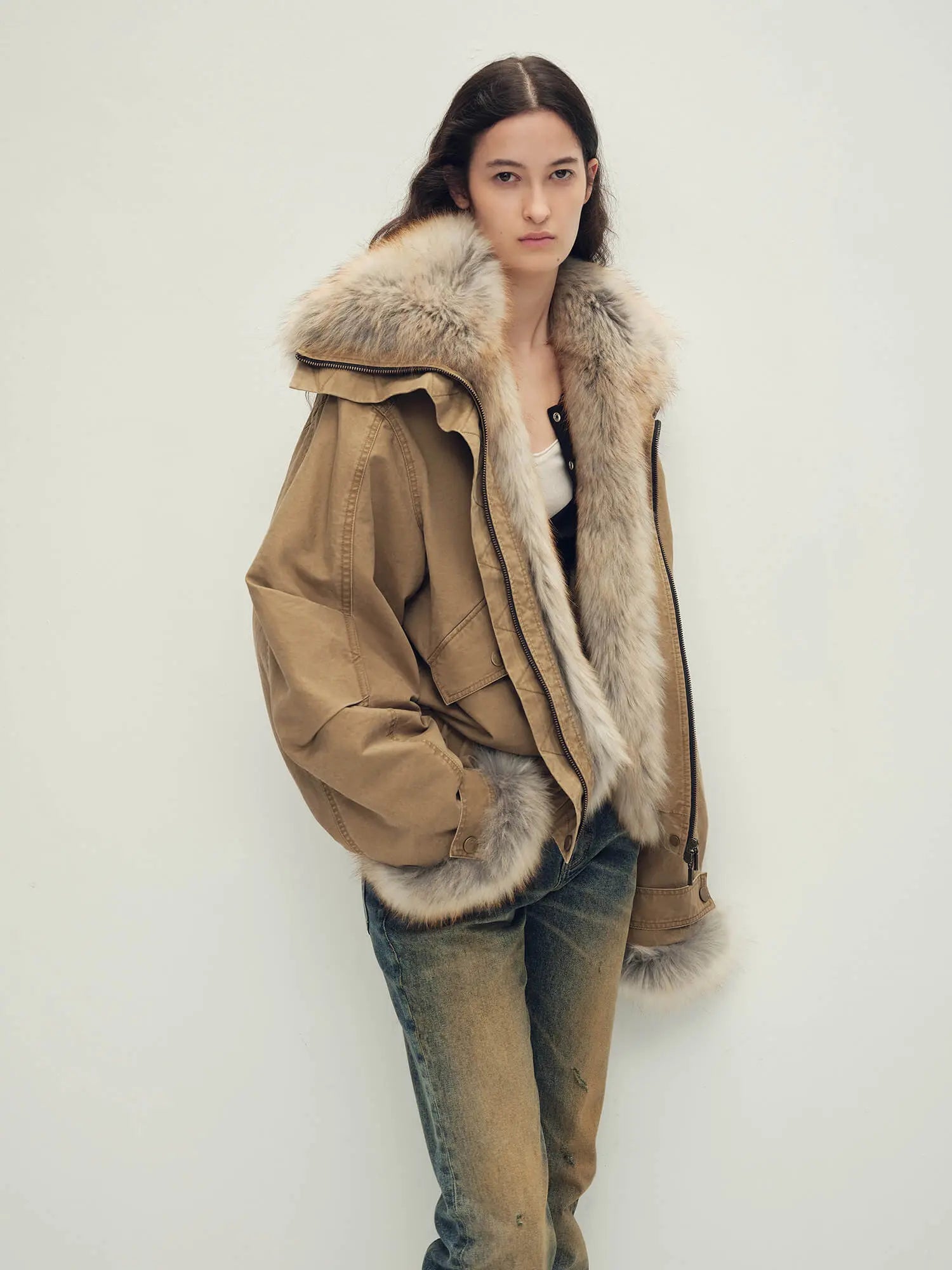 Three-quarter model view of Firelady Fur Nordic Woods Khaki raccoon fur down parka