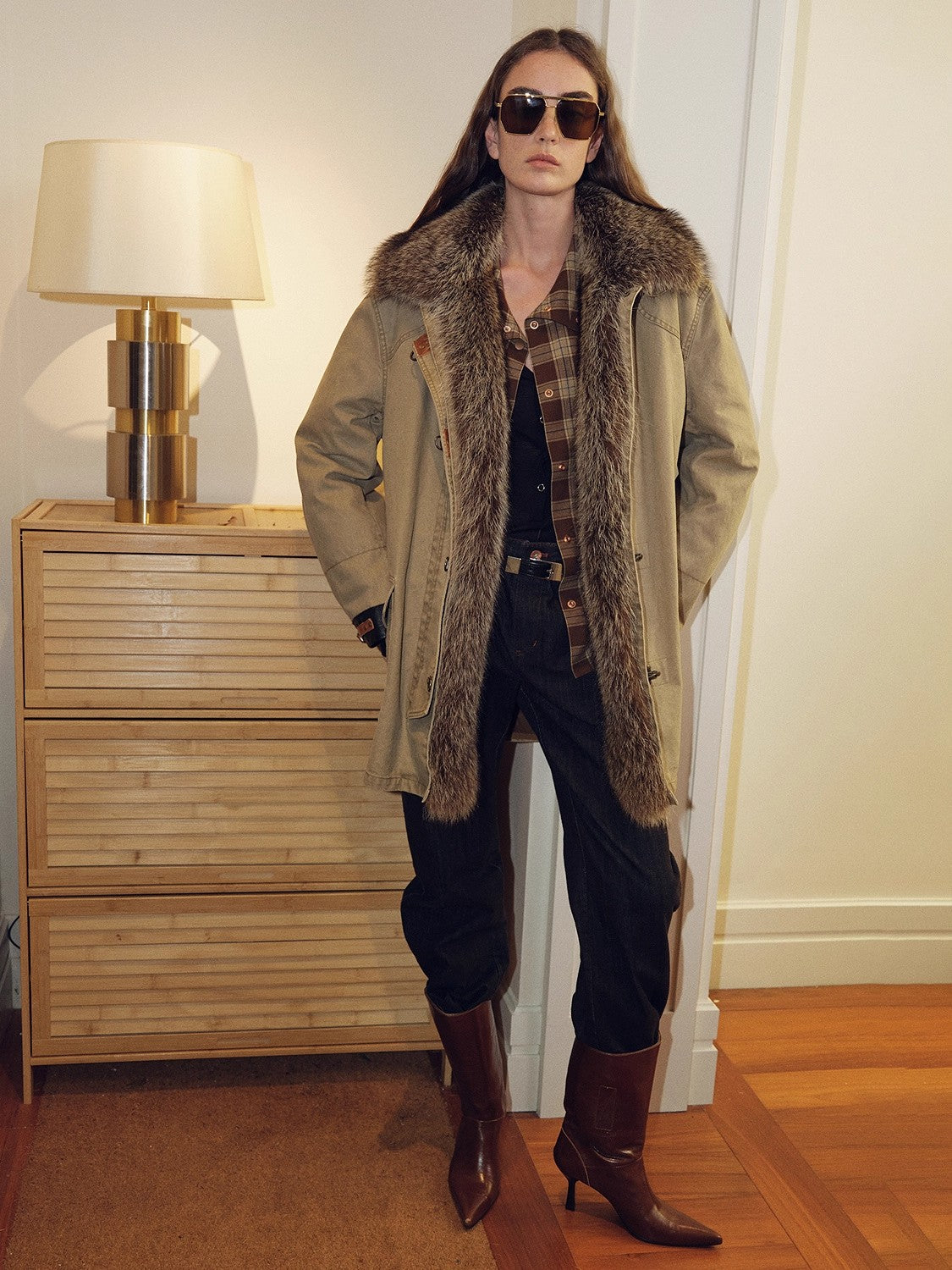 Long tan fur-trim parka styled for the final shopping step