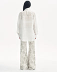 "Phantom" original snake print flared denim trousers - variant_title
