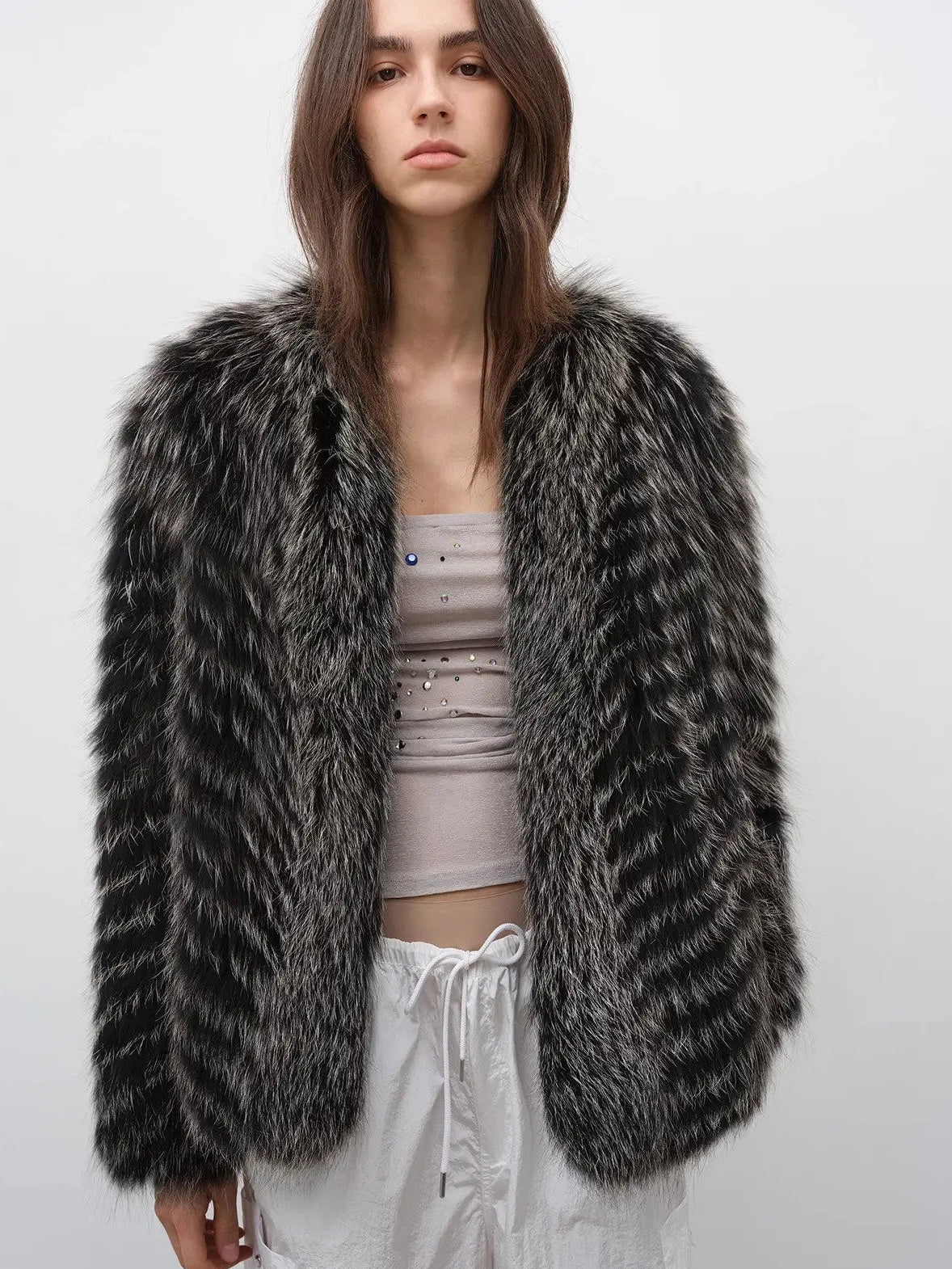Model wearing Polar Night Star Black and White fox fur coat, front view