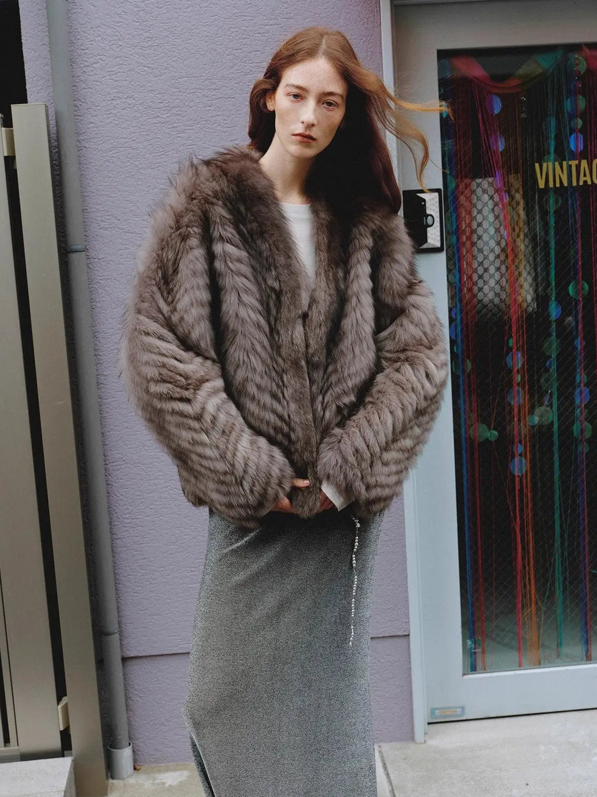 Polar Night Star Gray Brown fox fur coat in an outdoor setting, front view