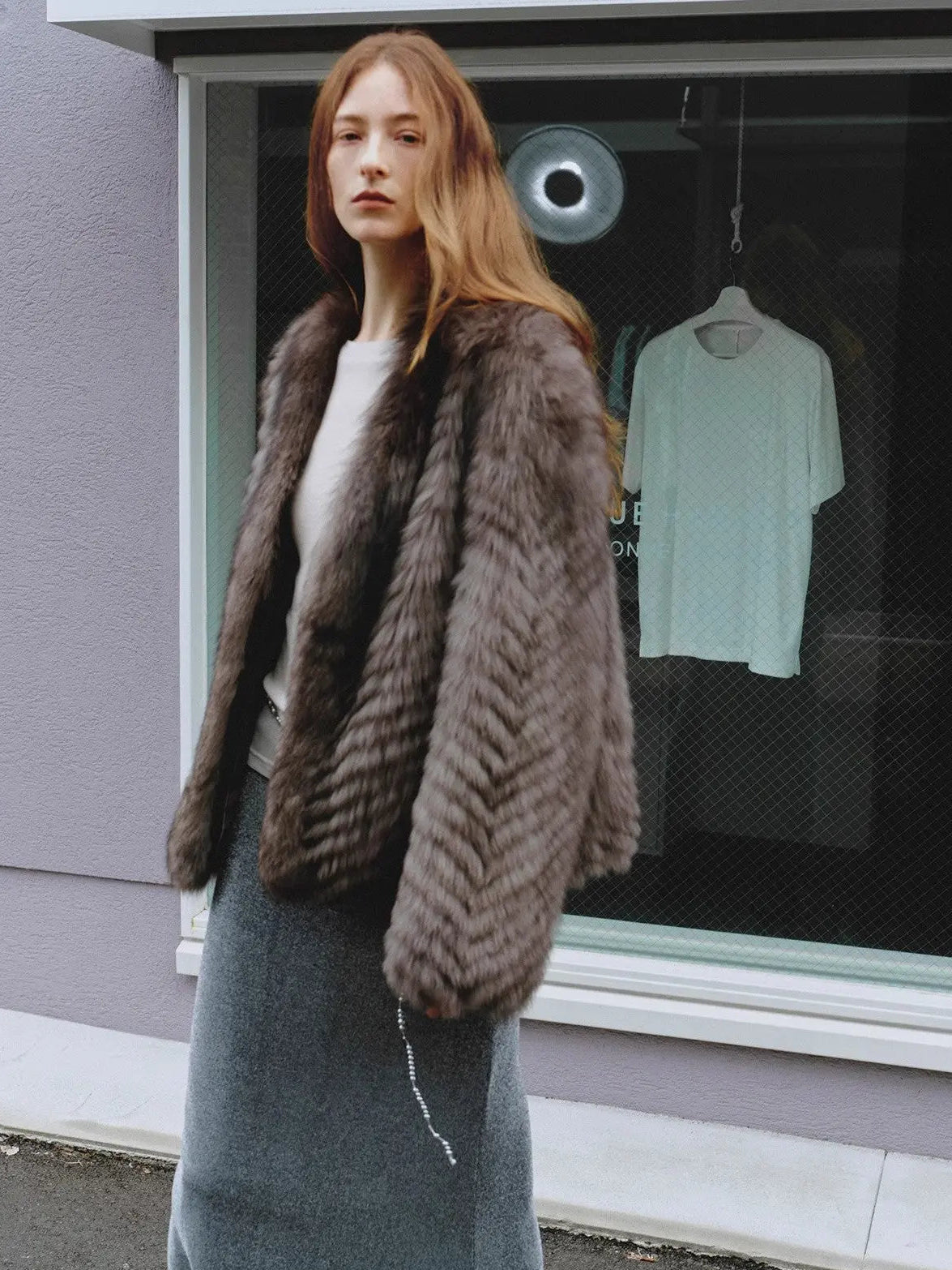 Polar Night Star Gray Brown fox fur coat in an outdoor setting, side view
