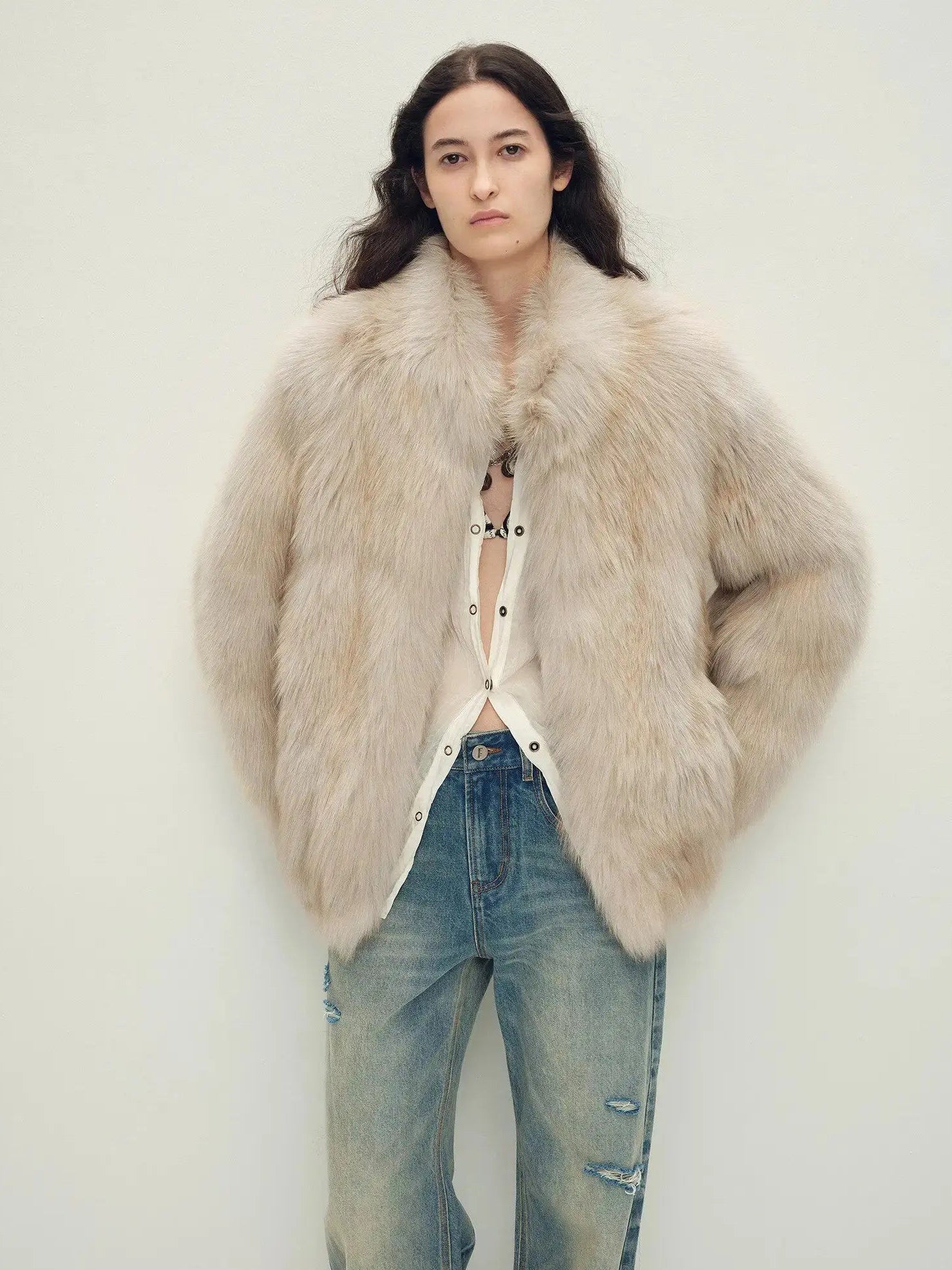 Model wearing Polar Snow Light Beige fox fur coat, front view