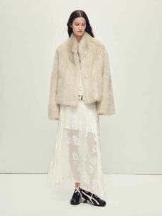 Elegant styling of the Practical Wearism cream white Toscana sheepskin coat