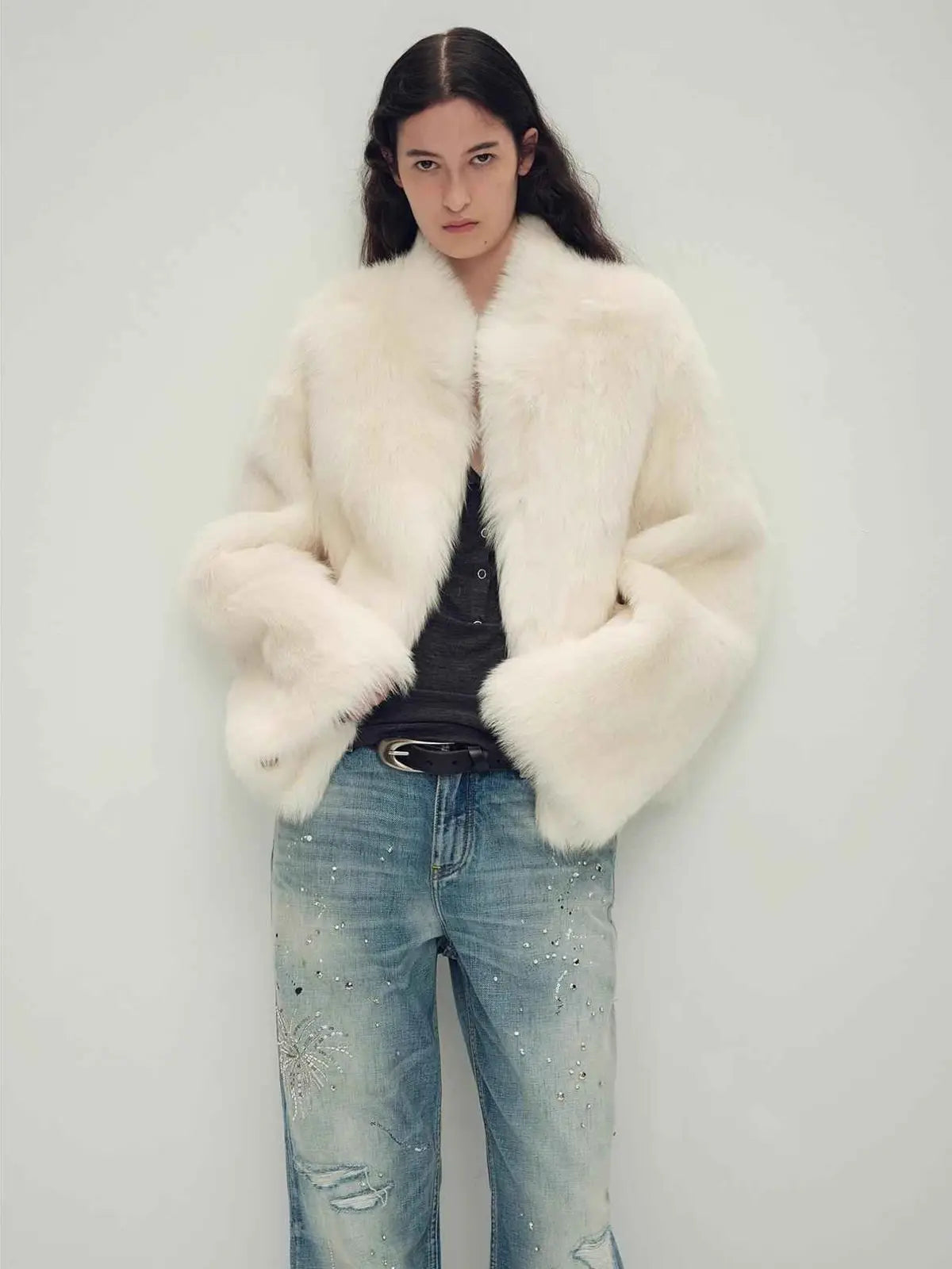 Model wearing the Practical Wearism cream white Toscana sheepskin coat, close front view