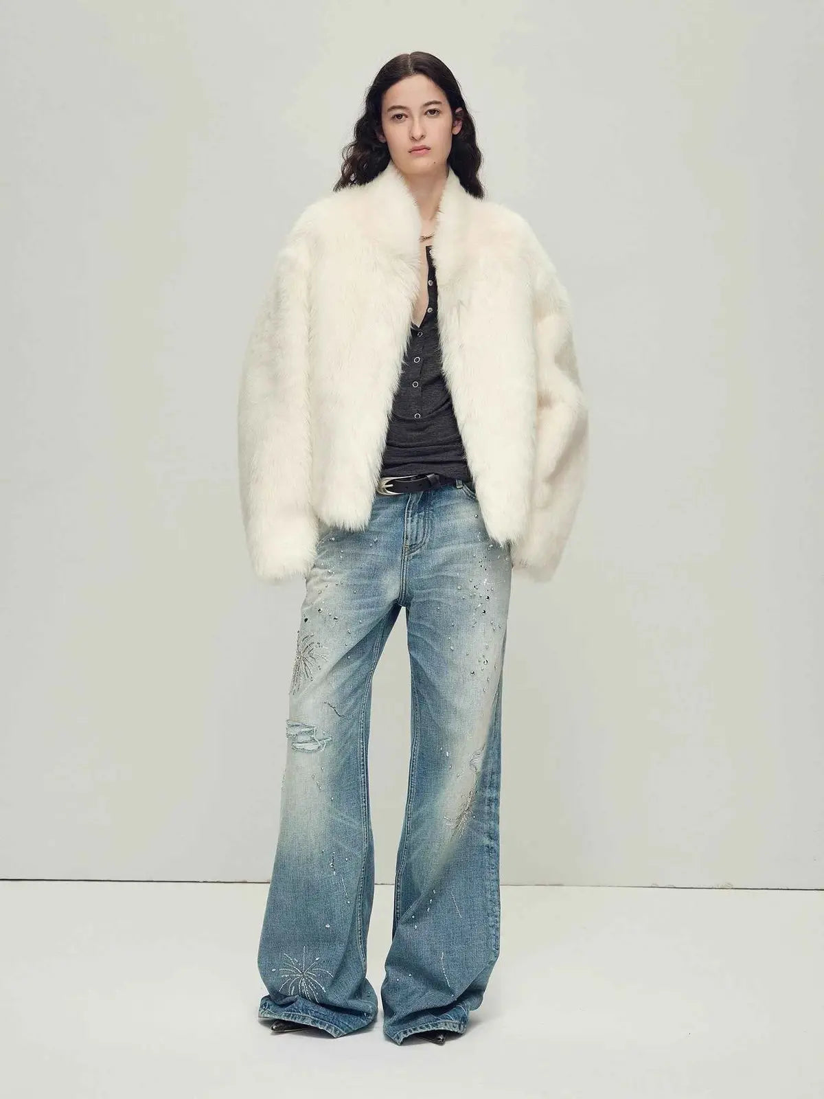 Model wearing the Practical Wearism cream white Toscana sheepskin coat, full-length view
