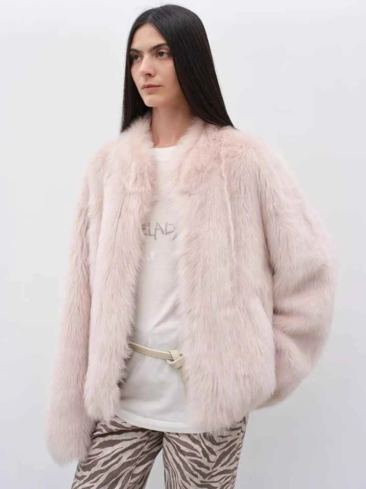 Model wearing the Practical Wearism dirty pink Toscana sheepskin coat, front view