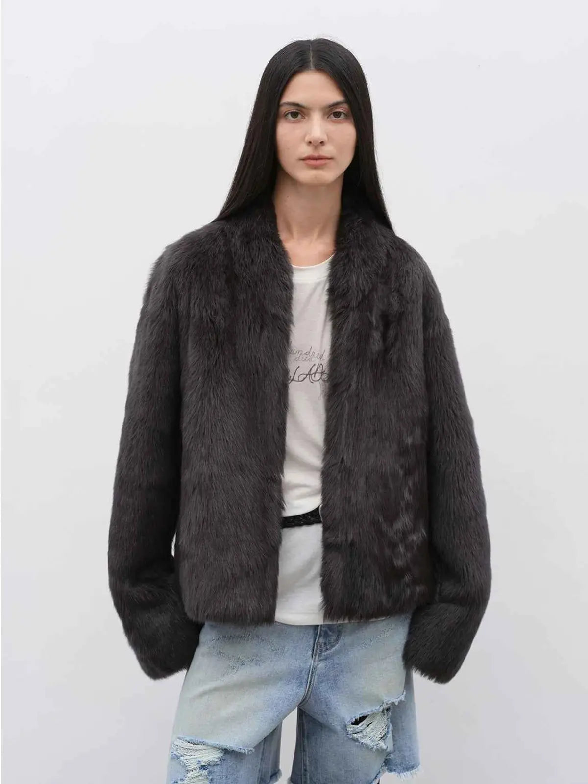 Model wearing the Practical Wearism ink gray Toscana sheepskin coat, front view