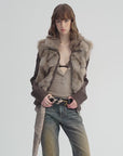 Moss Rock Brown Saga fox fur jacket styled with denim for winter layering