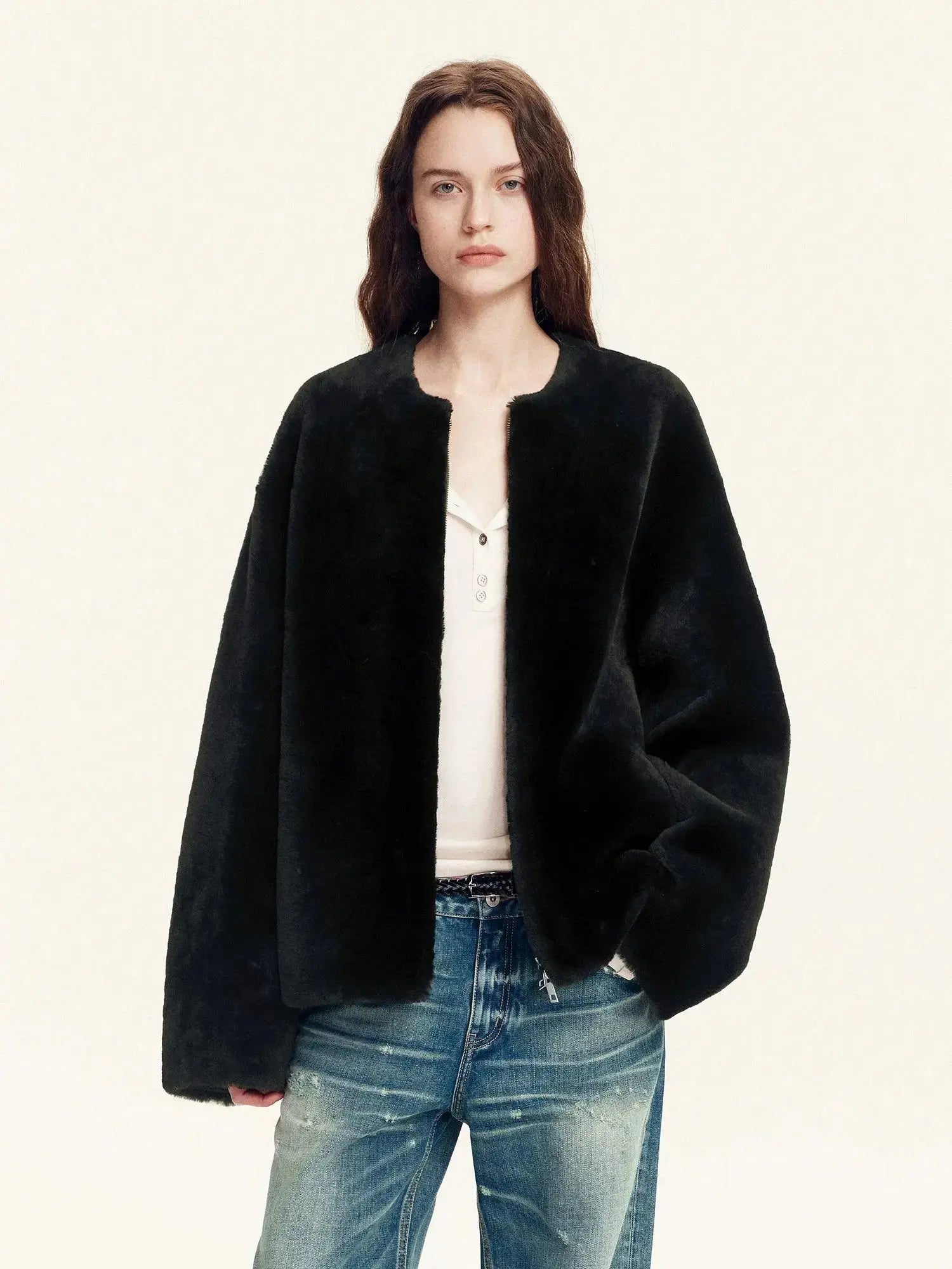 Quiet Warmth black Merino shearling jacket styled with denim