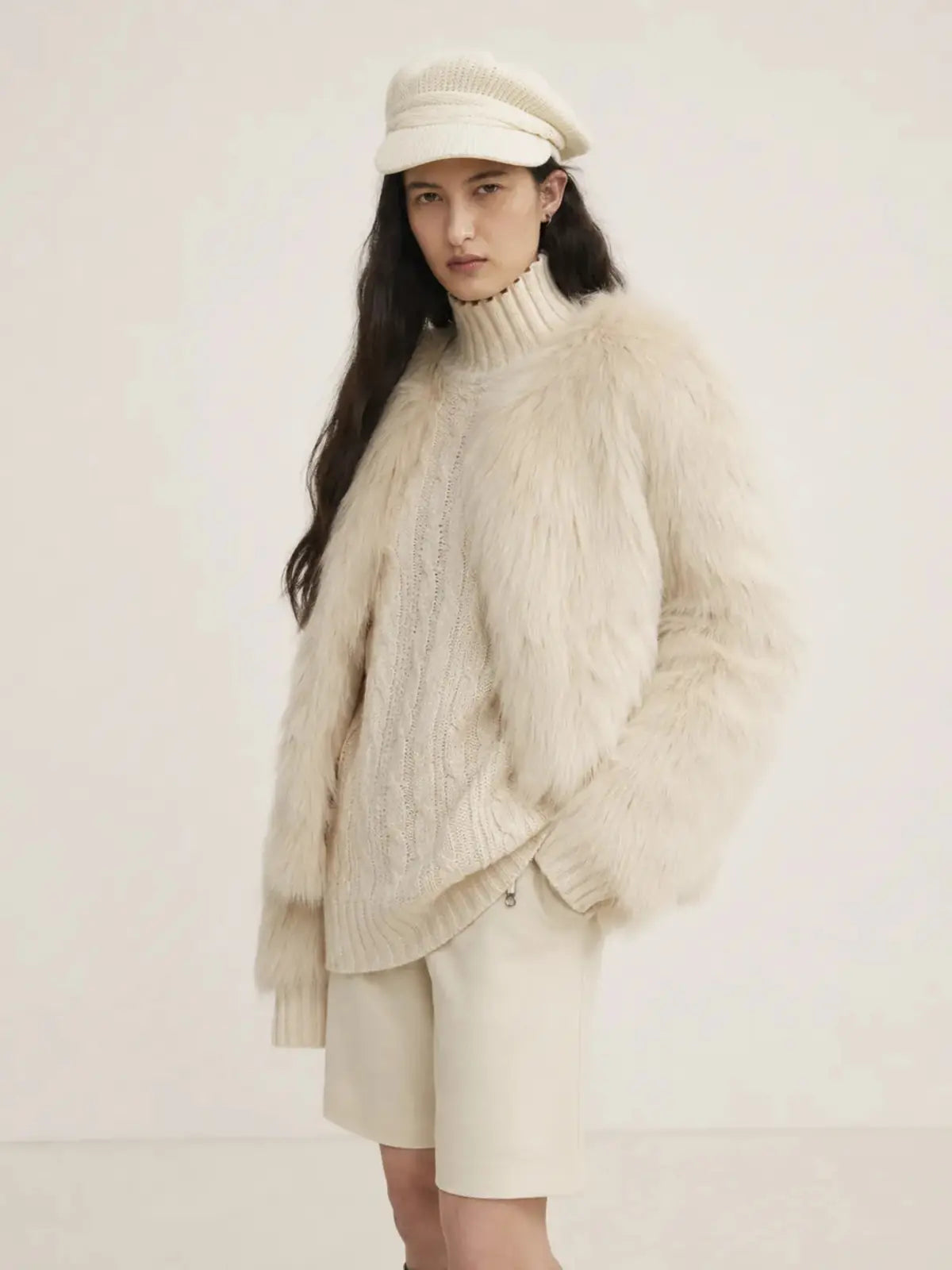 Reed Flower beige almond fox fur coat on model close-up