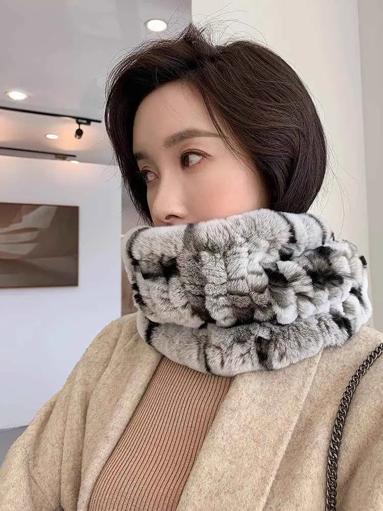 Woman wearing a grey rex rabbit fur elastic woven neck scarf in a close-up styling view