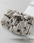 Grey rex rabbit fur elastic woven neck scarf shown in a clear product detail view