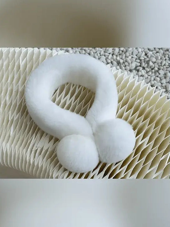 White Rex rabbit fur magnetic scarf for women styled on textured display