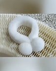 White Rex rabbit fur magnetic scarf for women styled on textured display
