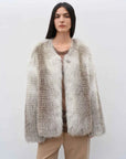 Model wearing Romantic Nordic Sunburst Fox fur coat, front view