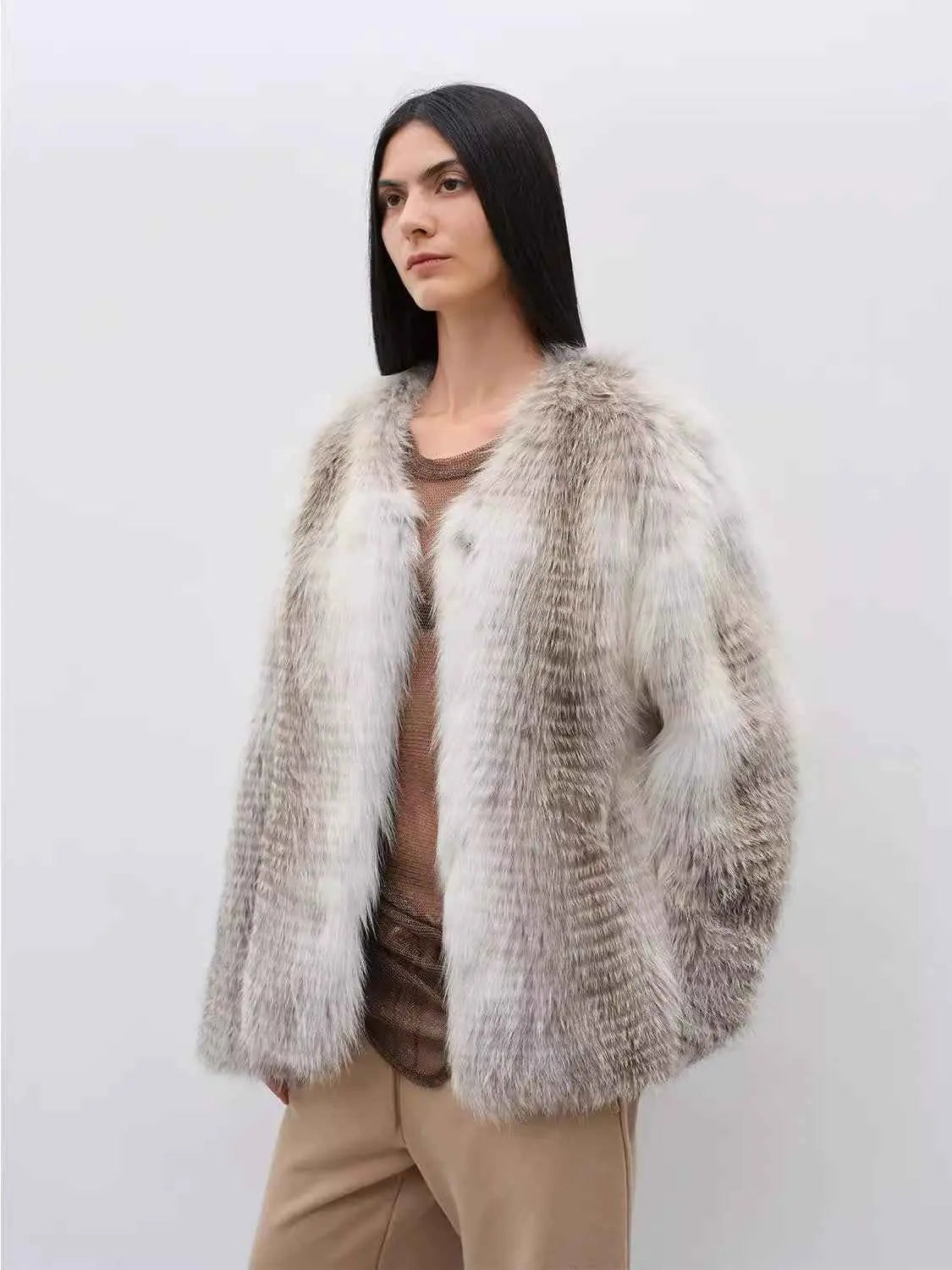 Romantic Nordic Sunburst Fox fur coat in a relaxed model pose