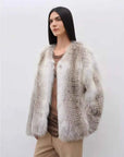 Romantic Nordic Sunburst Fox fur coat in a relaxed model pose
