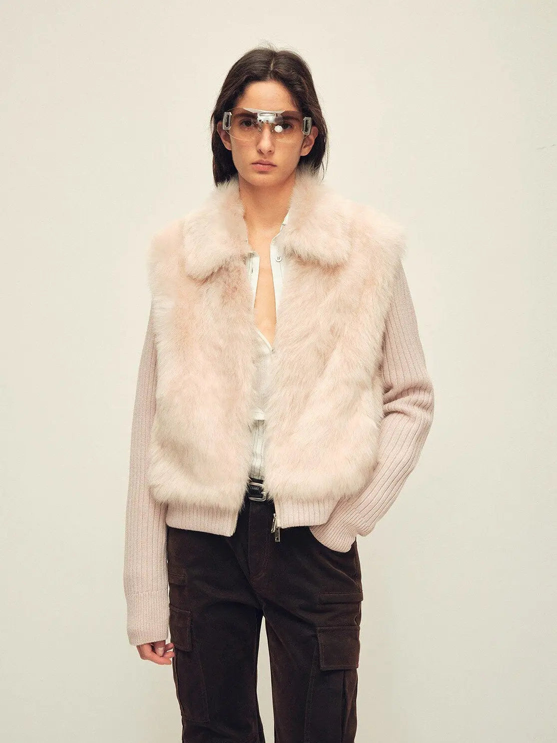 Model wearing the Silky Cocoa dusty pink shearling coat with detachable sleeves