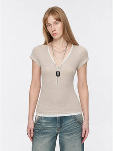 Flower Ash merino wool Tencel deep V-neck zipper short sleeve top on model front view