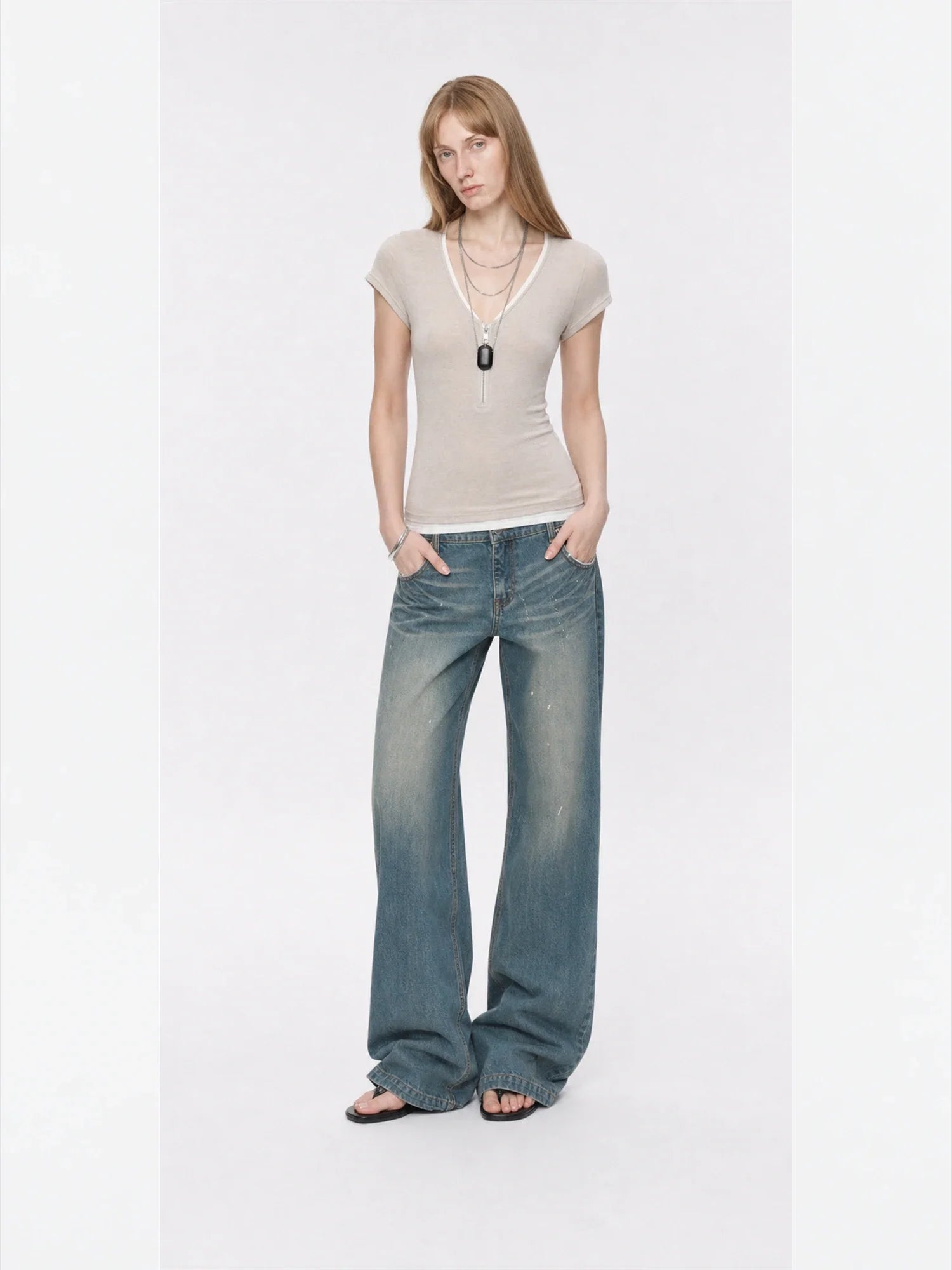 Flower Ash merino wool Tencel deep V-neck zipper short sleeve top on model full front view