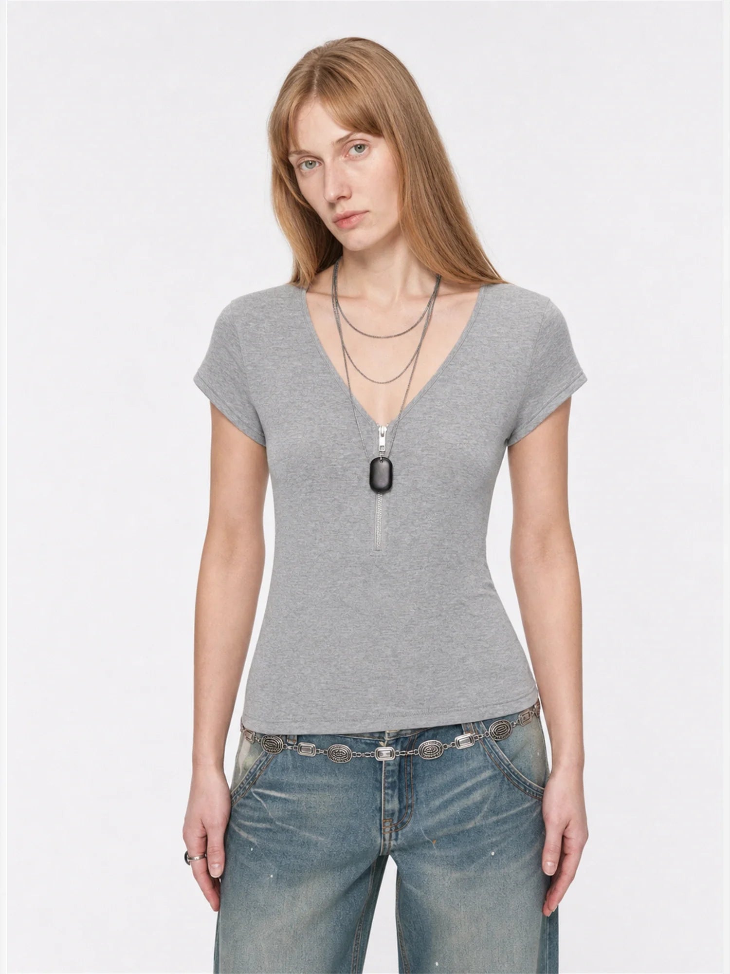 Khaki Gray merino wool Tencel deep V-neck zipper short sleeve top on model front view
